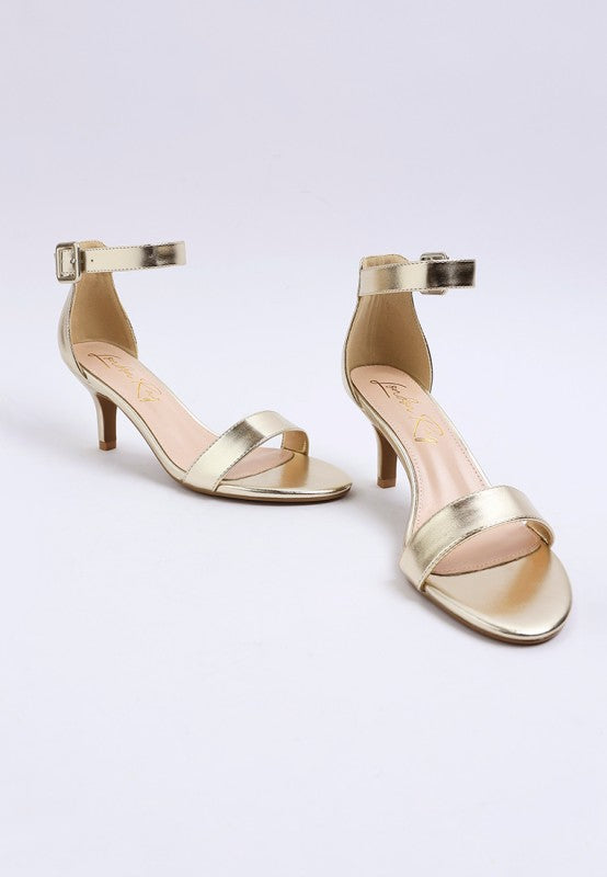 Metallic gold kitten heel sandals with ankle strap and open round toe