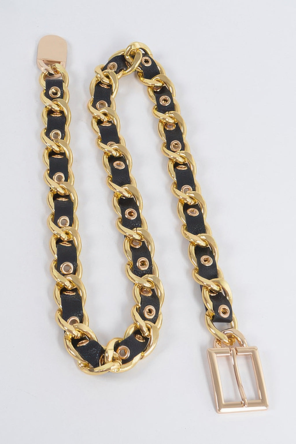 Chain fashion belt set with black straps and gold-tone links; small bag-charm drop