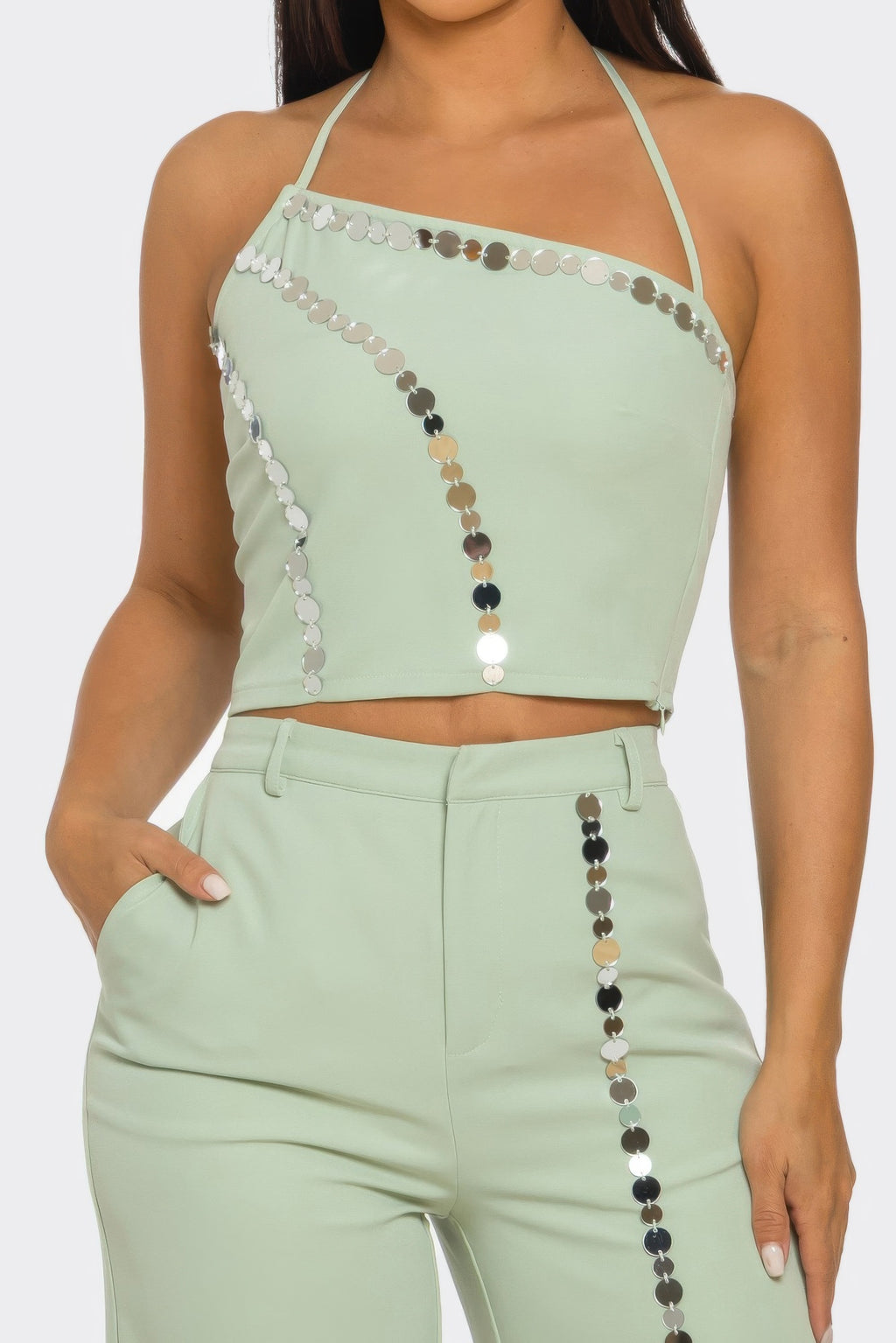 Sage halter crop top & pants close-up, coin-sequin trim along bust and side