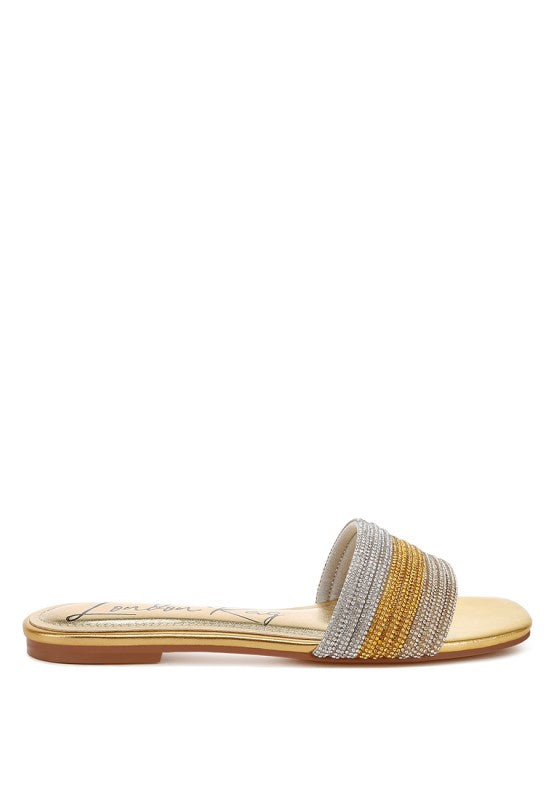 Gold slip-on flats with rhinestone toe strap in silver and gold