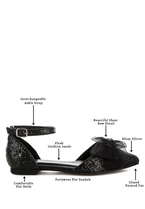 Black glitter flat sandals: sheer bow detail, cushioned insole, ankle strap