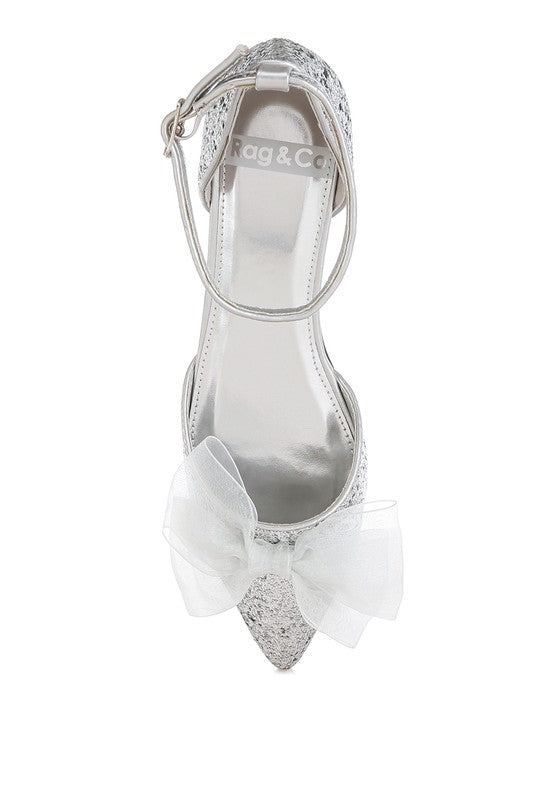 Silver pointed-toe flat sandal with ankle strap and sheer bow on top