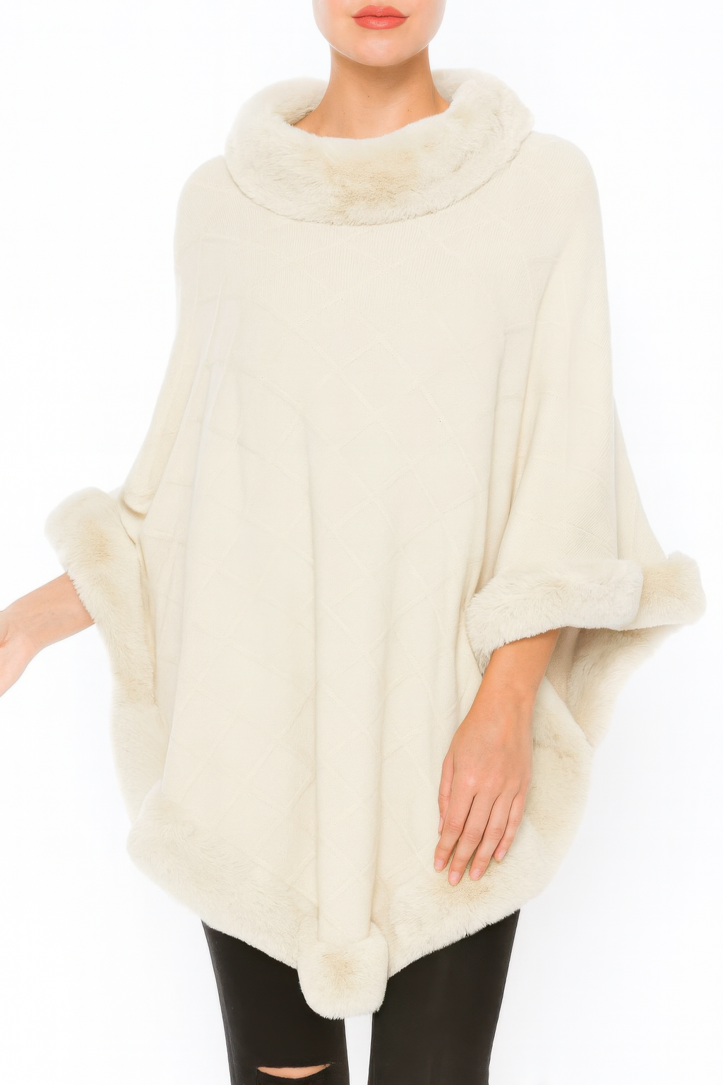 Ivory quilted poncho with faux-fur trim at hood, hem, and sleeves