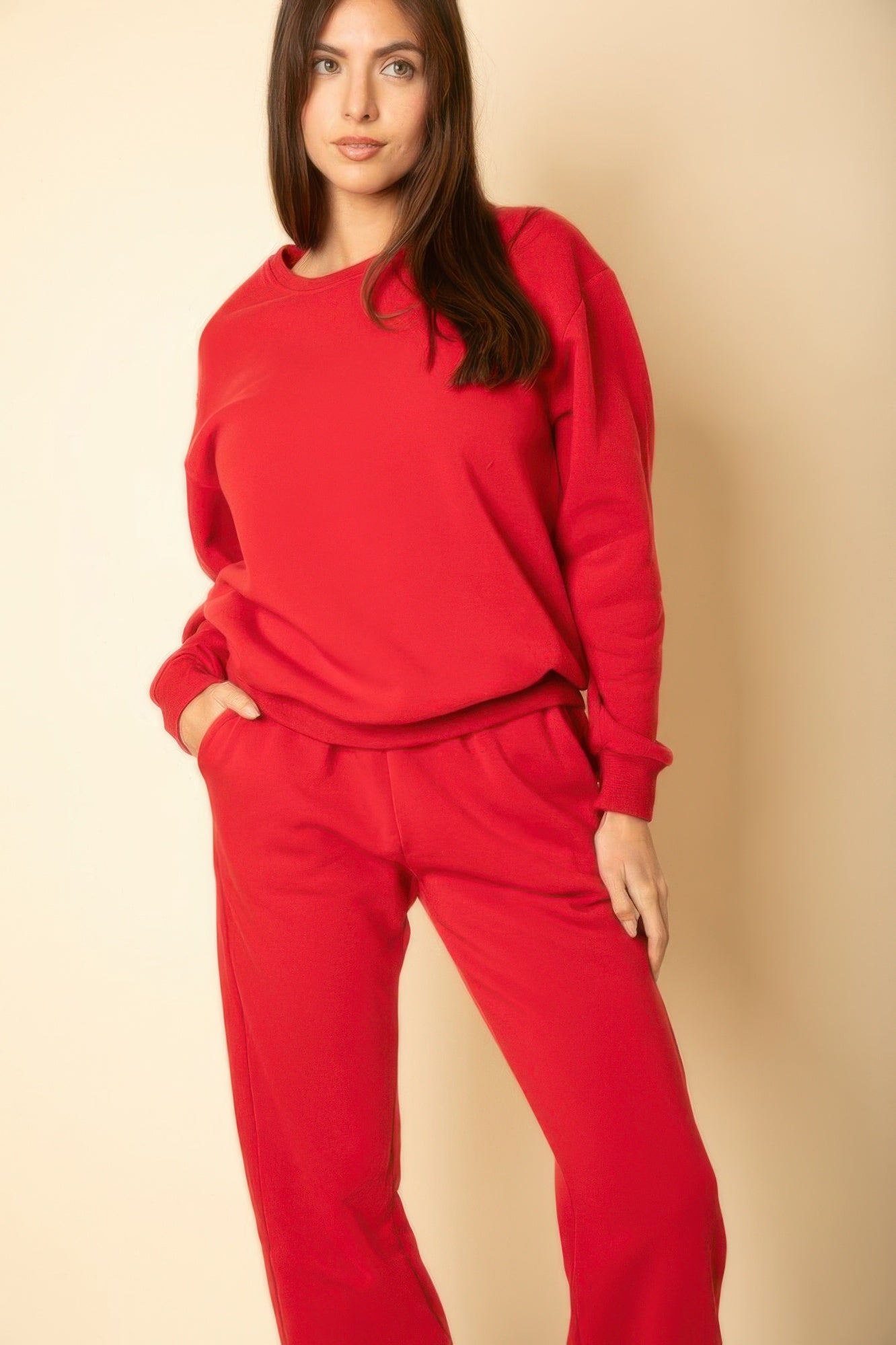 Red crewneck pullover in poly fleece with ribbed hem and cuffs