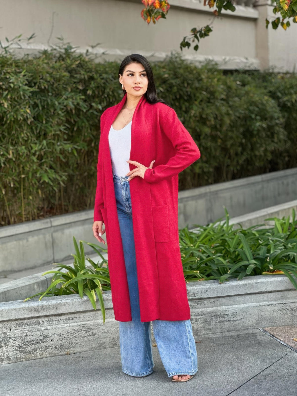 Red long cardigan with side pockets and open front, midi length fine knit
