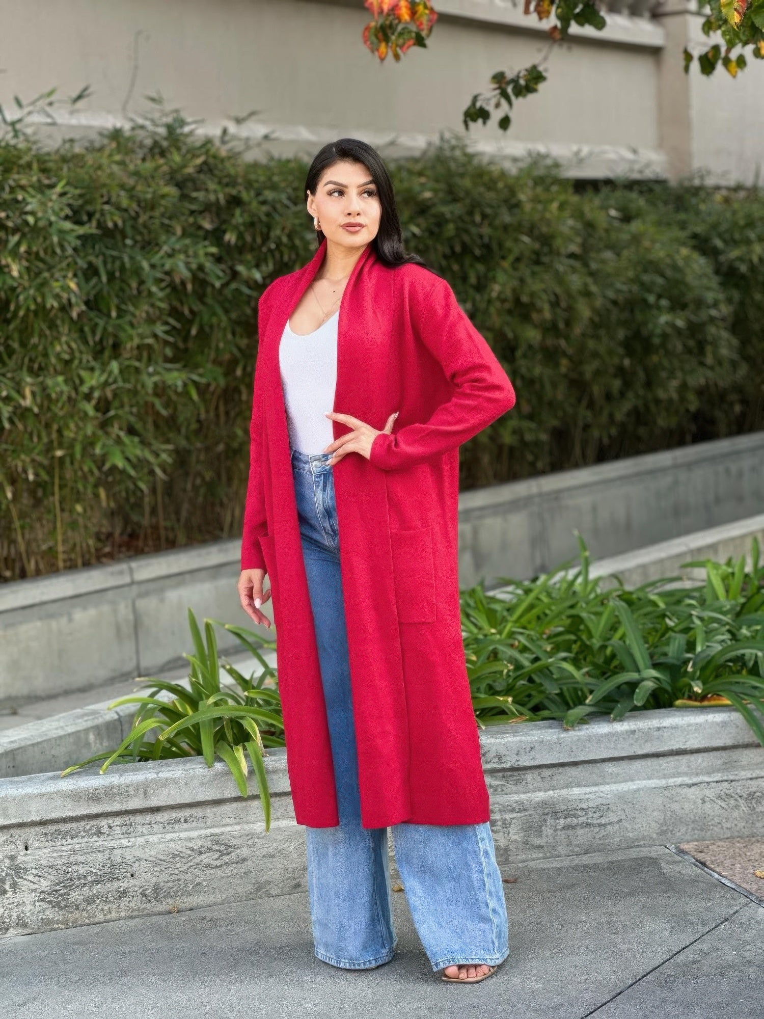 Red long cardigan with side pockets and open front, midi length fine knit