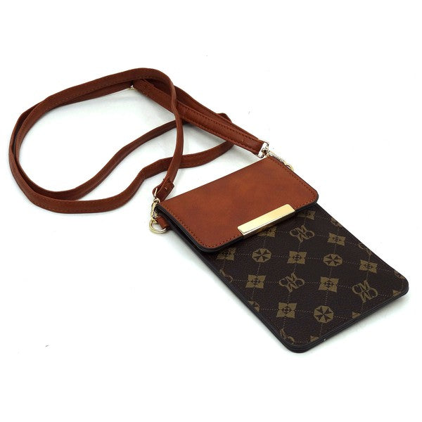 CM monogram phone crossbody bag laid flat, brown leather flap with gold bar closure