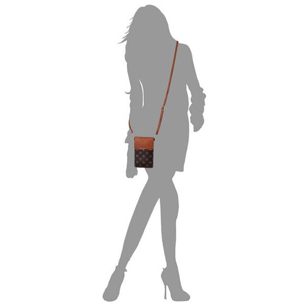 Crossbody phone bag on person: small brown monogram pouch with shoulder strap