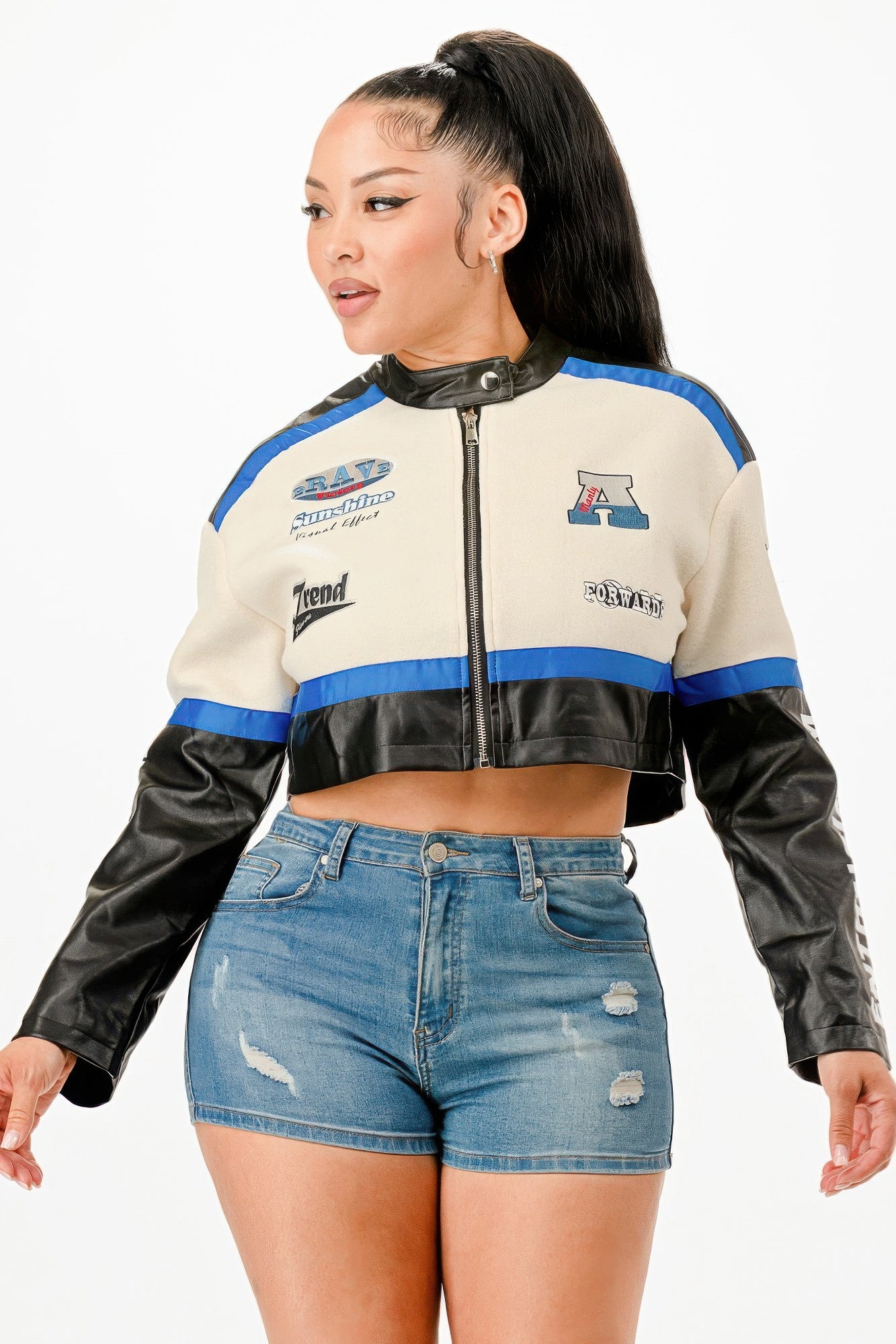 Colorblock crop jacket, cream panels with blue stripe, black sleeves, zip front and collar snaps