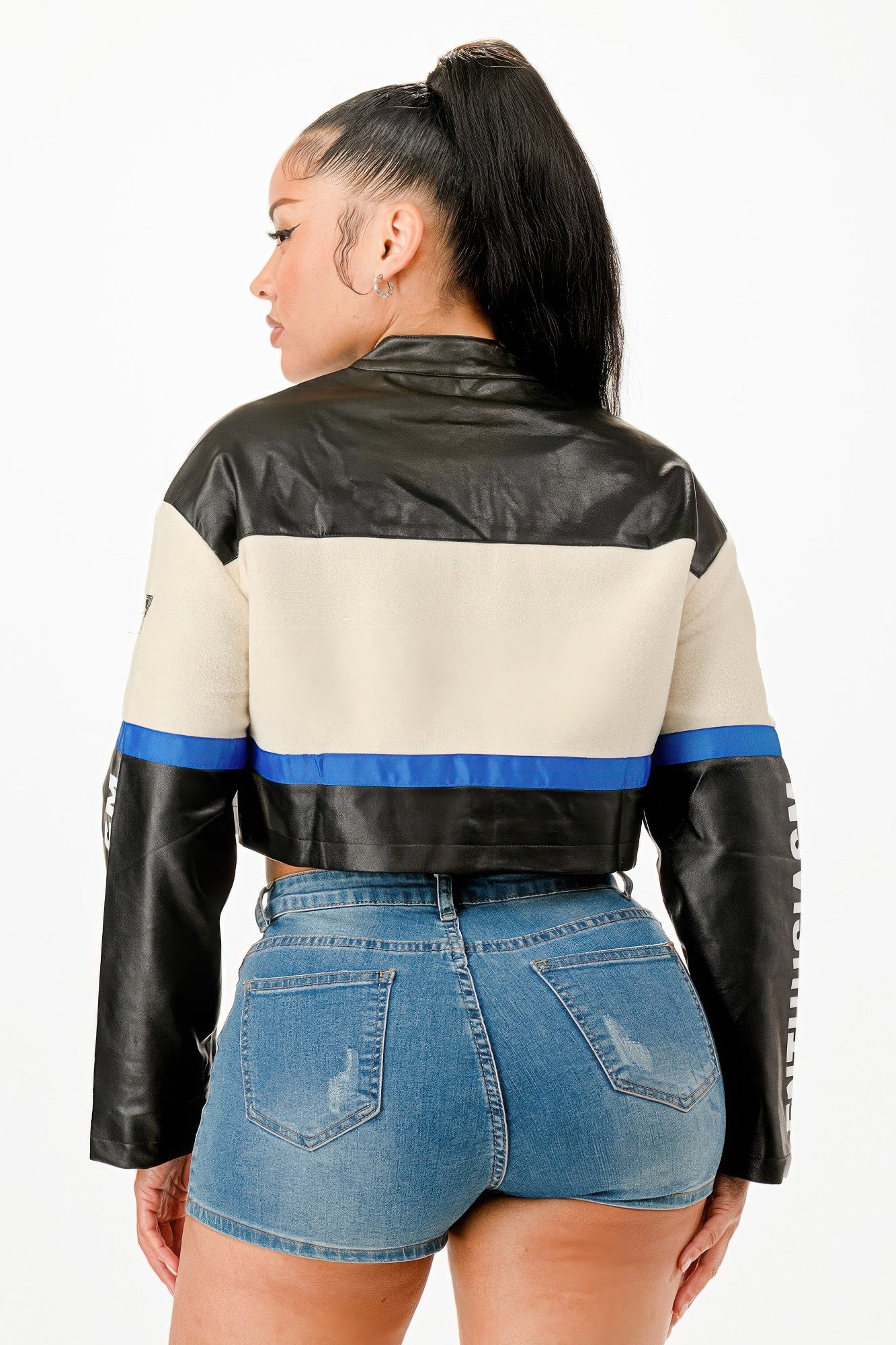 Colorblock crop jacket back view, cream upper panel with blue stripe and black lower back
