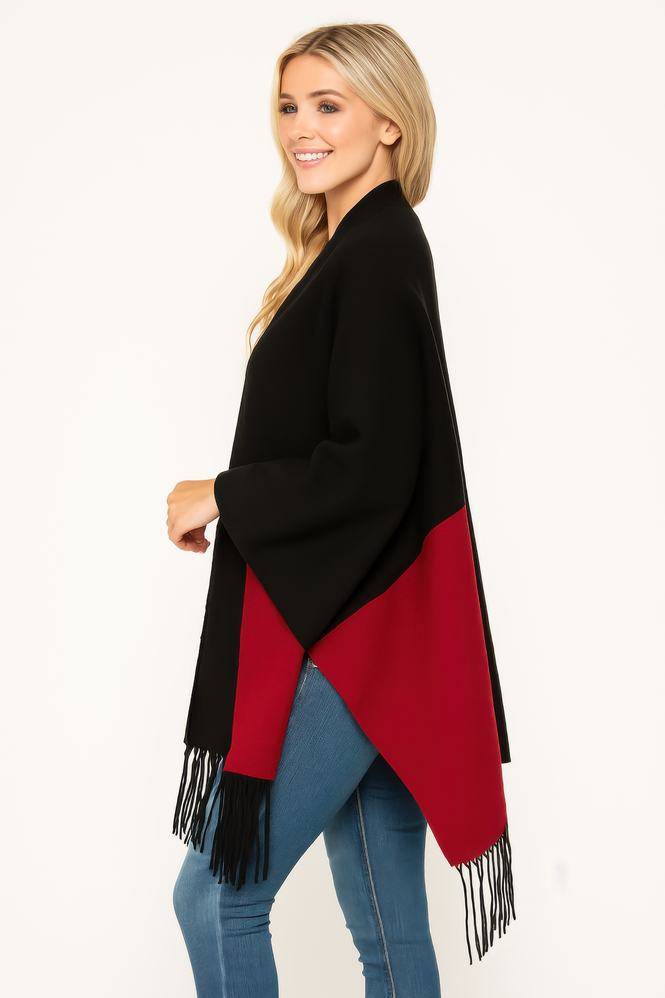 Black open wrap with diagonal red panel and black fringe hem