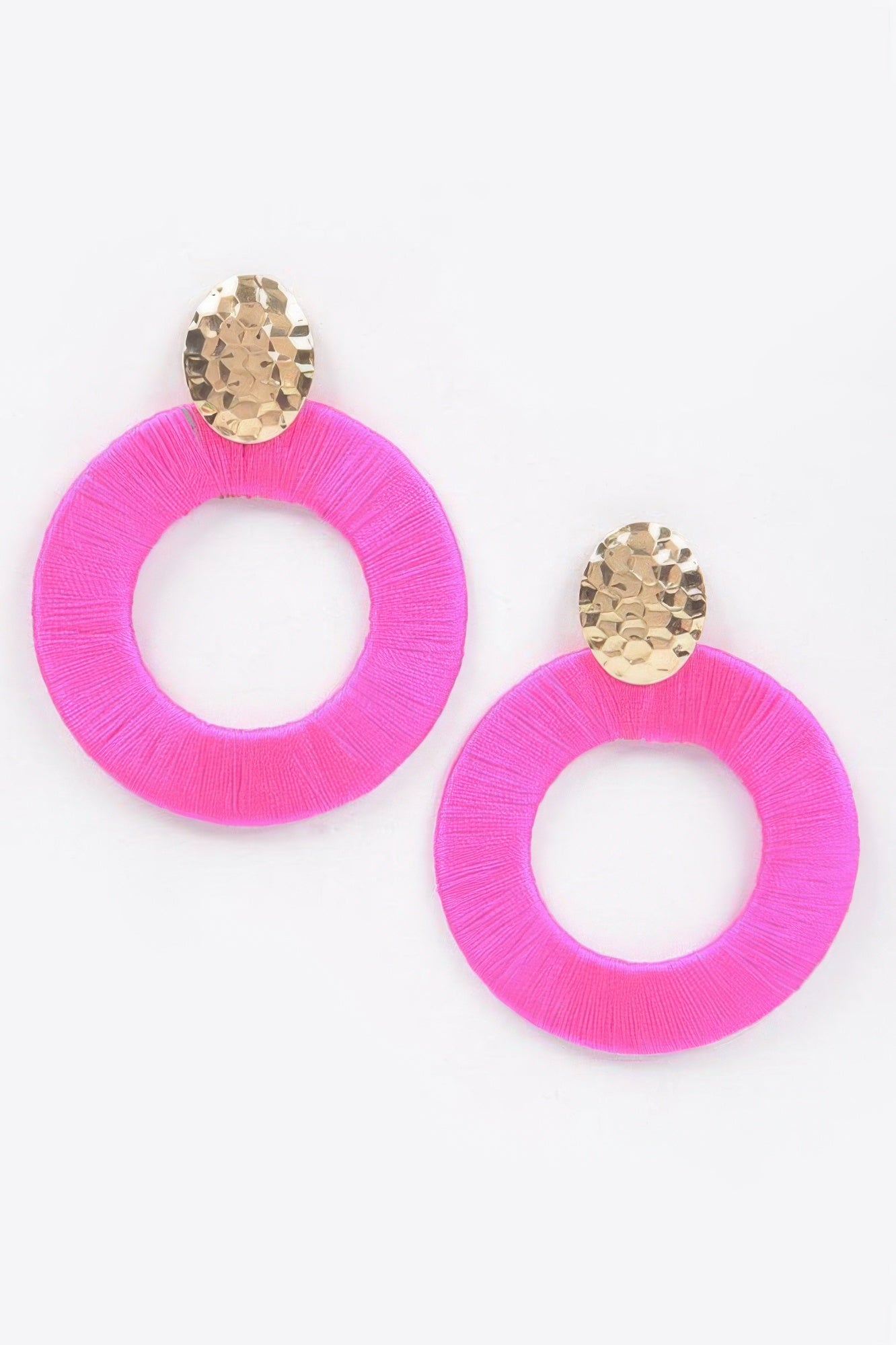 Colorful thread hoop earrings, fuchsia pink circular hoops with gold-toned stud tops.