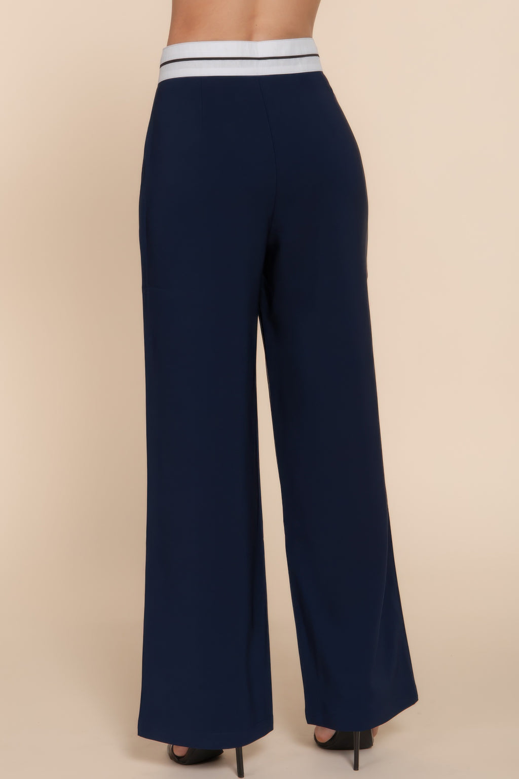 Back view of contrast waistband straight long pants, dark navy with wide legs