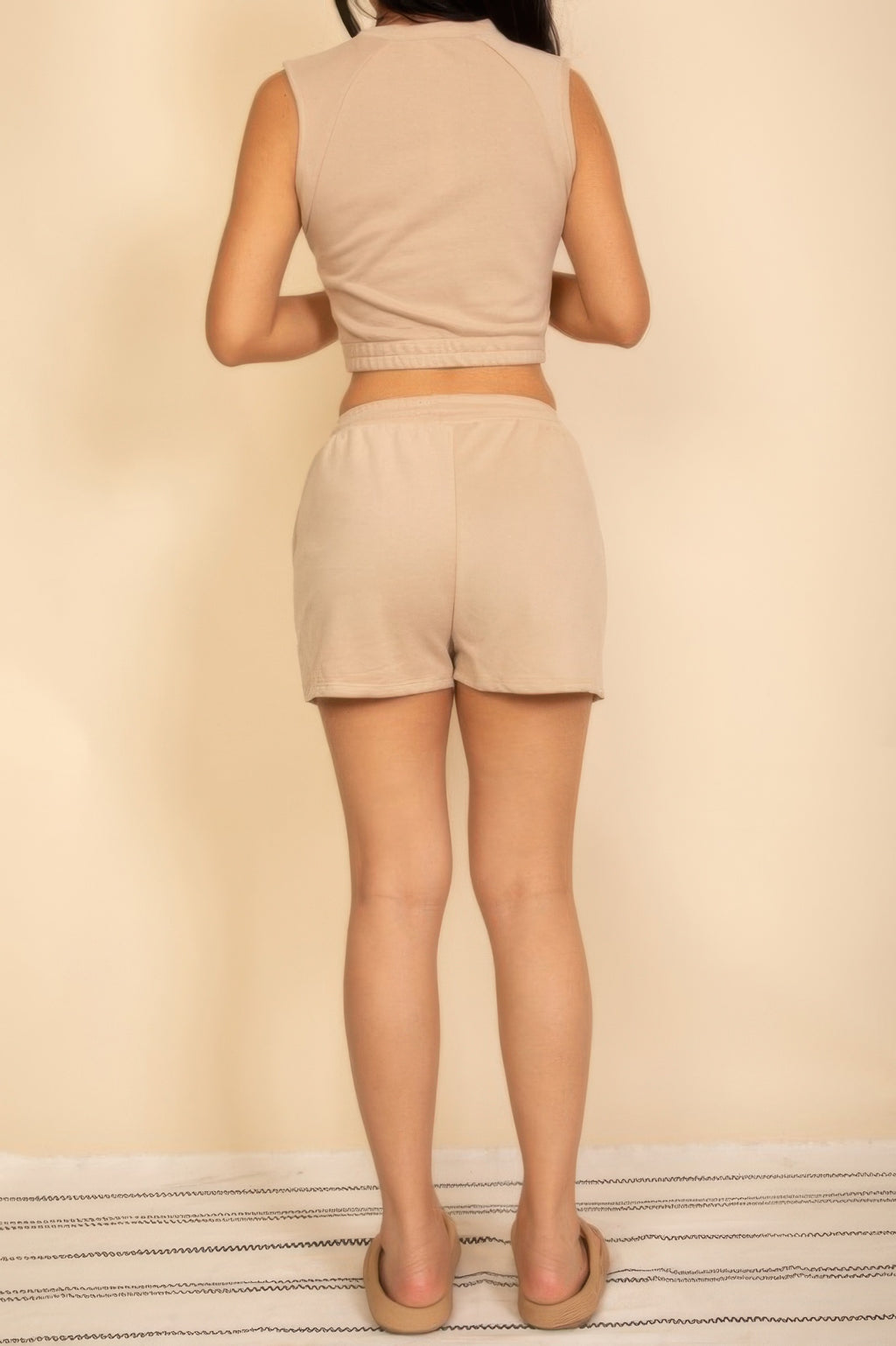 Sand beige rear view of crop top and shorts set with elastic waistband