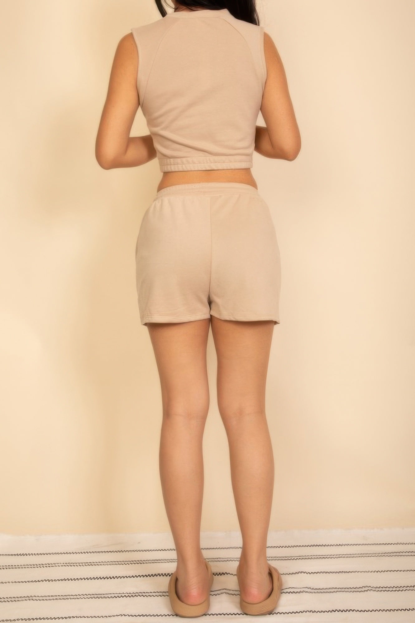 Sand beige rear view of crop top and shorts set with elastic waistband