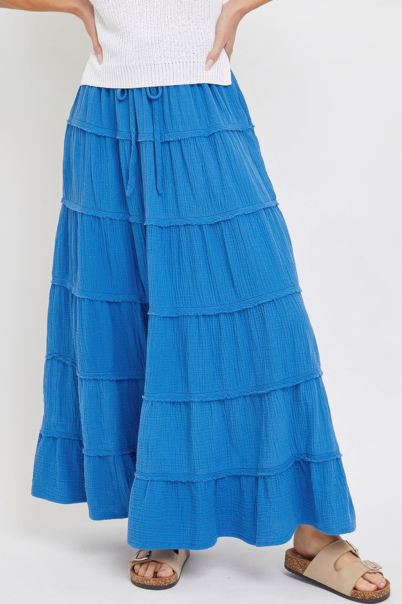 Blue maxi skirt with tiered ruffle panels and gathered elastic waistband