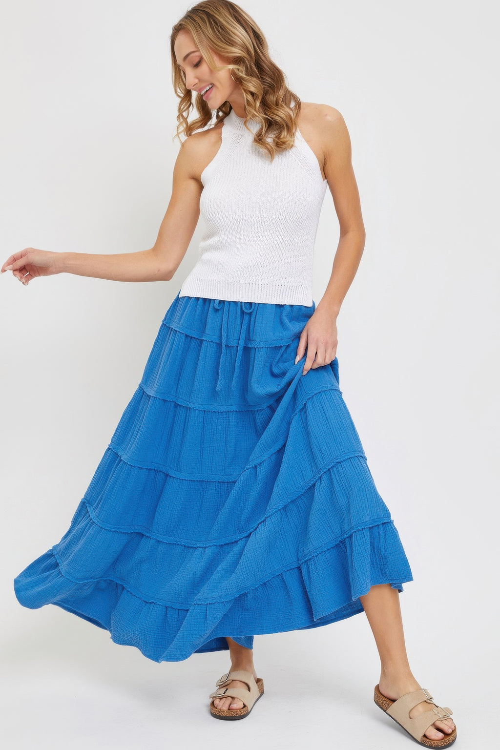 Blue tiered maxi skirt with sweeping layered ruffle tiers and tied waist drawstring