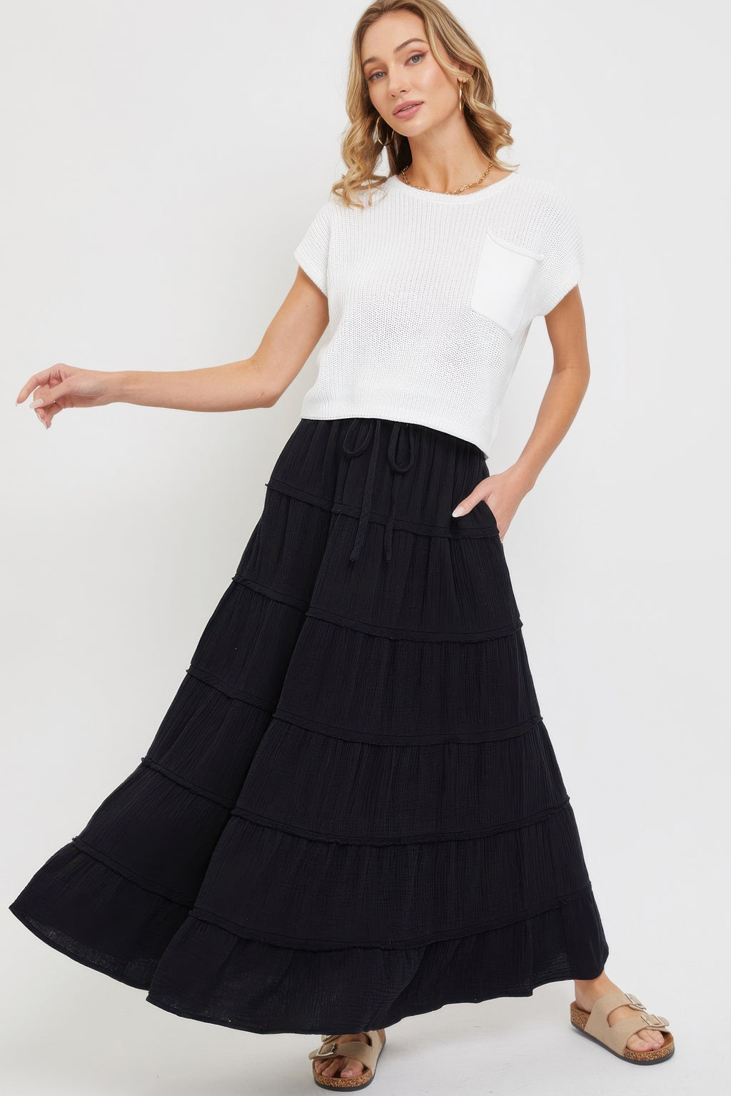 Black tiered maxi skirt with layered ruffle tiers and elastic waistband