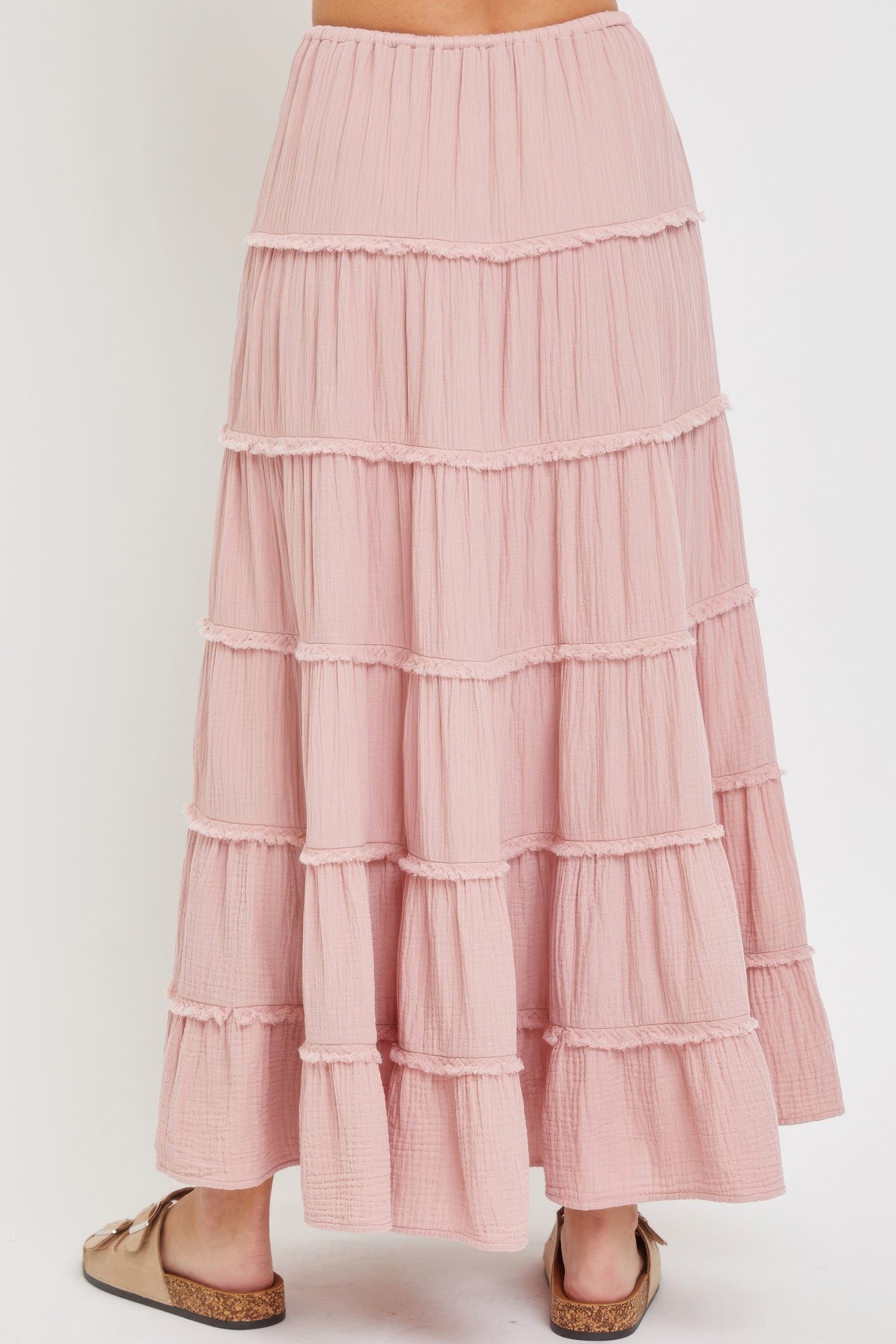 Blush pink cotton gauze tiered maxi skirt, close-up of stacked ruffle tiers