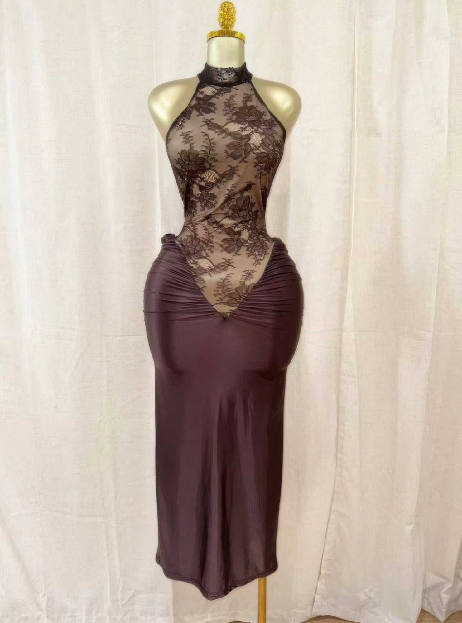 Crimson lace hourglass dress with halter neckline and sheer floral bodice, ruched waist