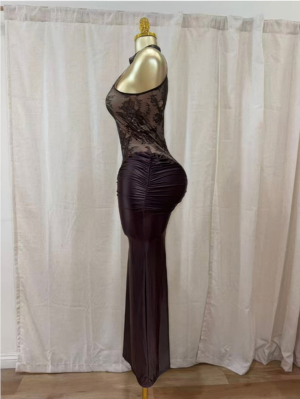 Sleeveless fitted lace hourglass dress with halter neck and ruched skirt, dark plum tone