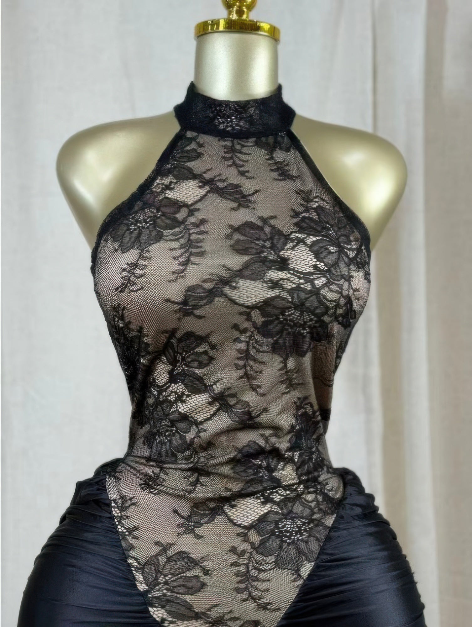 Front view black lace hourglass dress with high neckline and sheer floral mesh bodice
