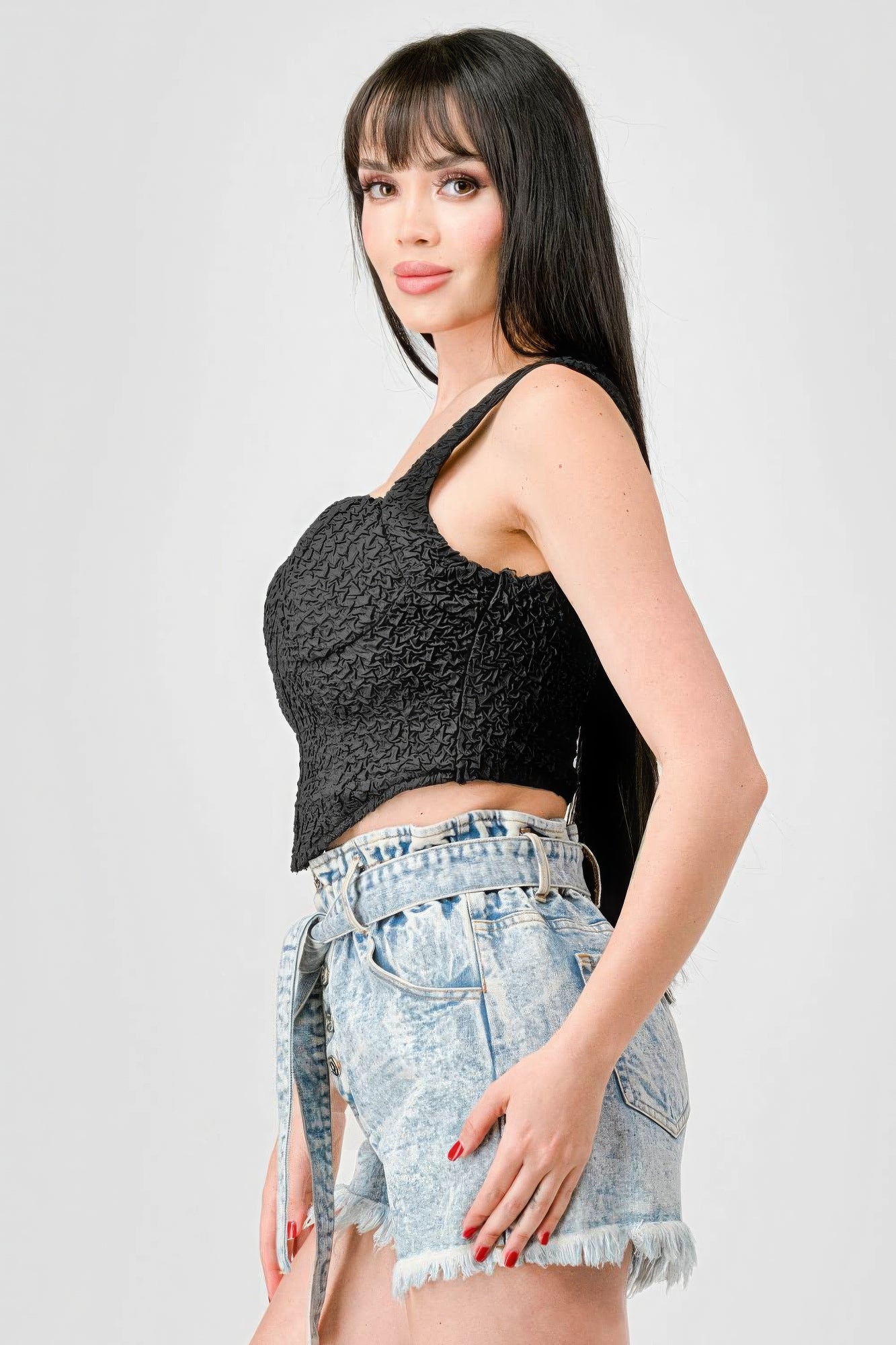 Black crinkle stretch knit sweetheart bustier cropped top, textured front panel