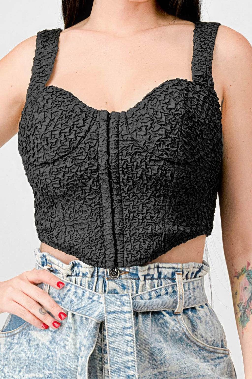 Black sweetheart bustier cropped top with crinkled texture and center vertical seam