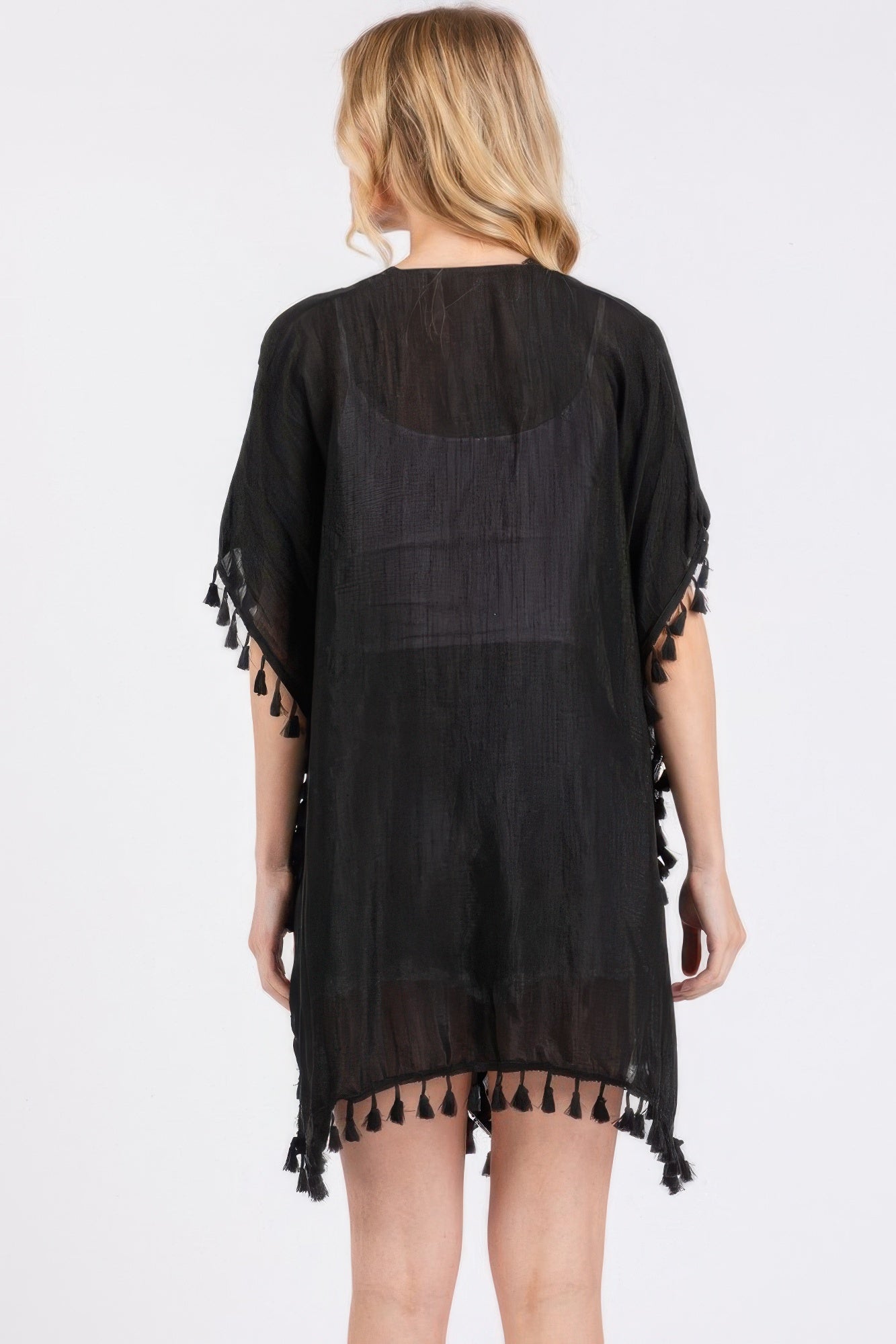Black back view cover-up with crochet yoke and tassel hem
