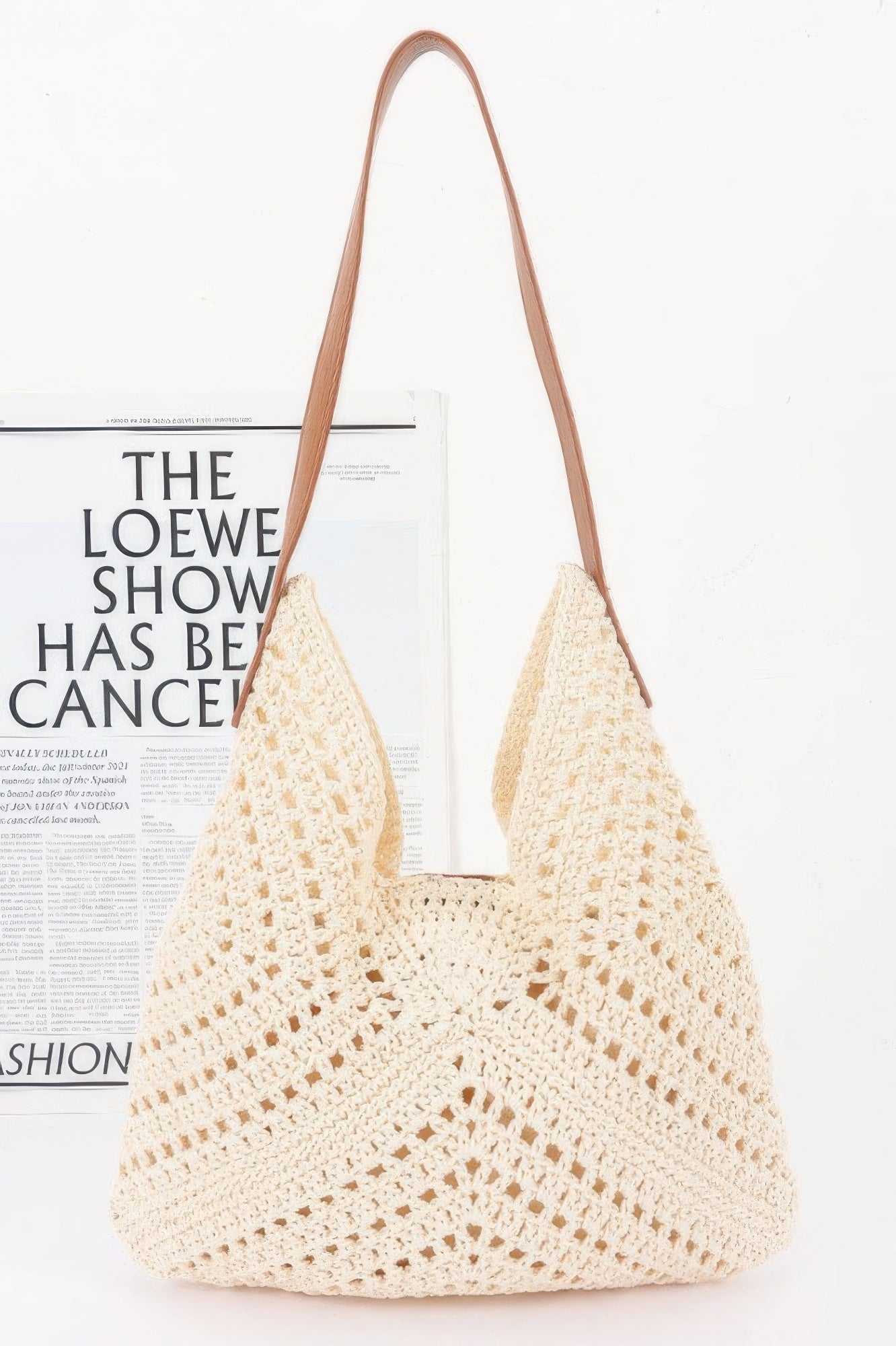 Crochet shoulder bag with pouch, ivory openwork knit and long leather-look handles.