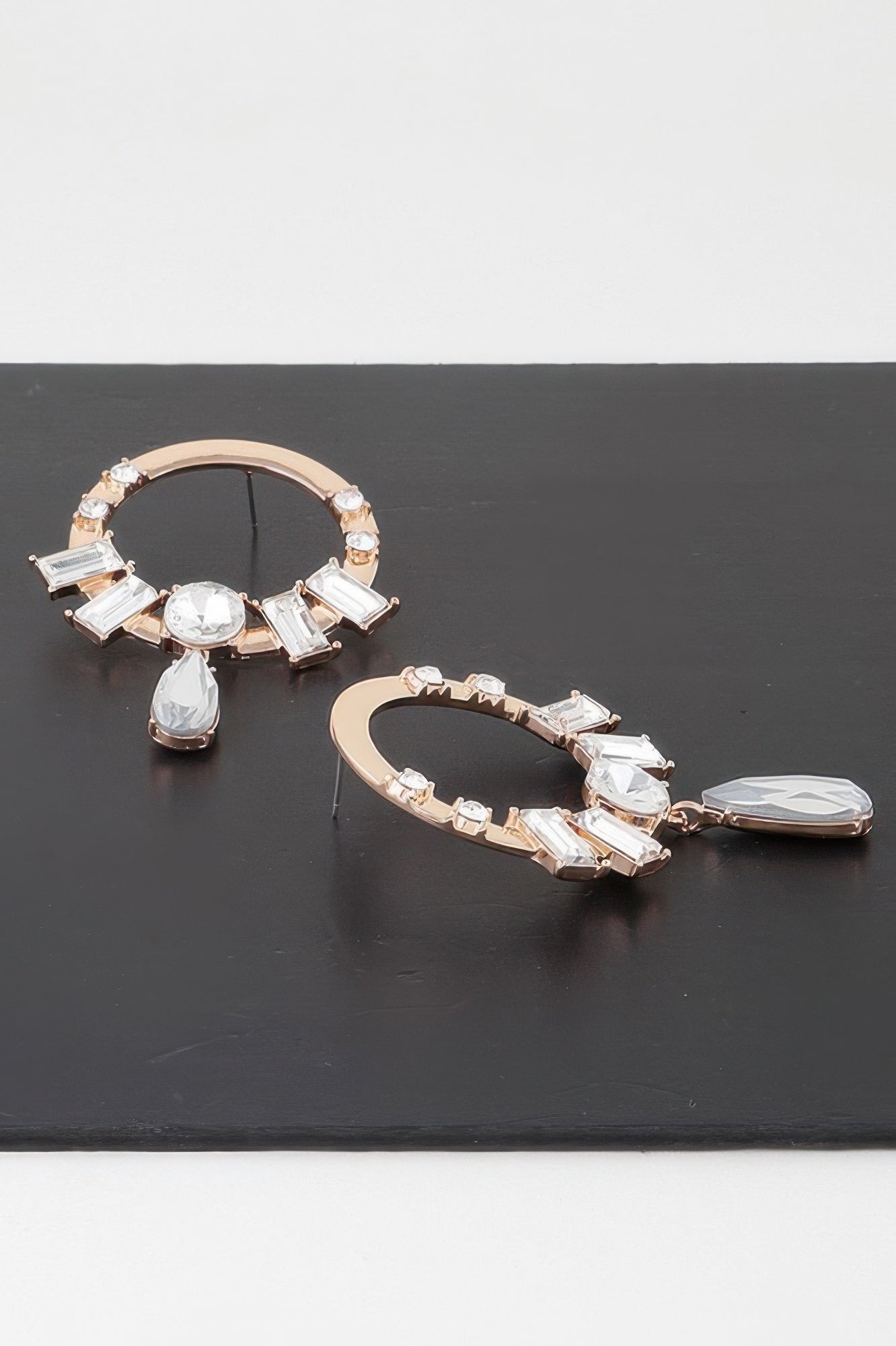 Gold-tone crystal rim drop earrings with circular hoop, baguette and pear dangles