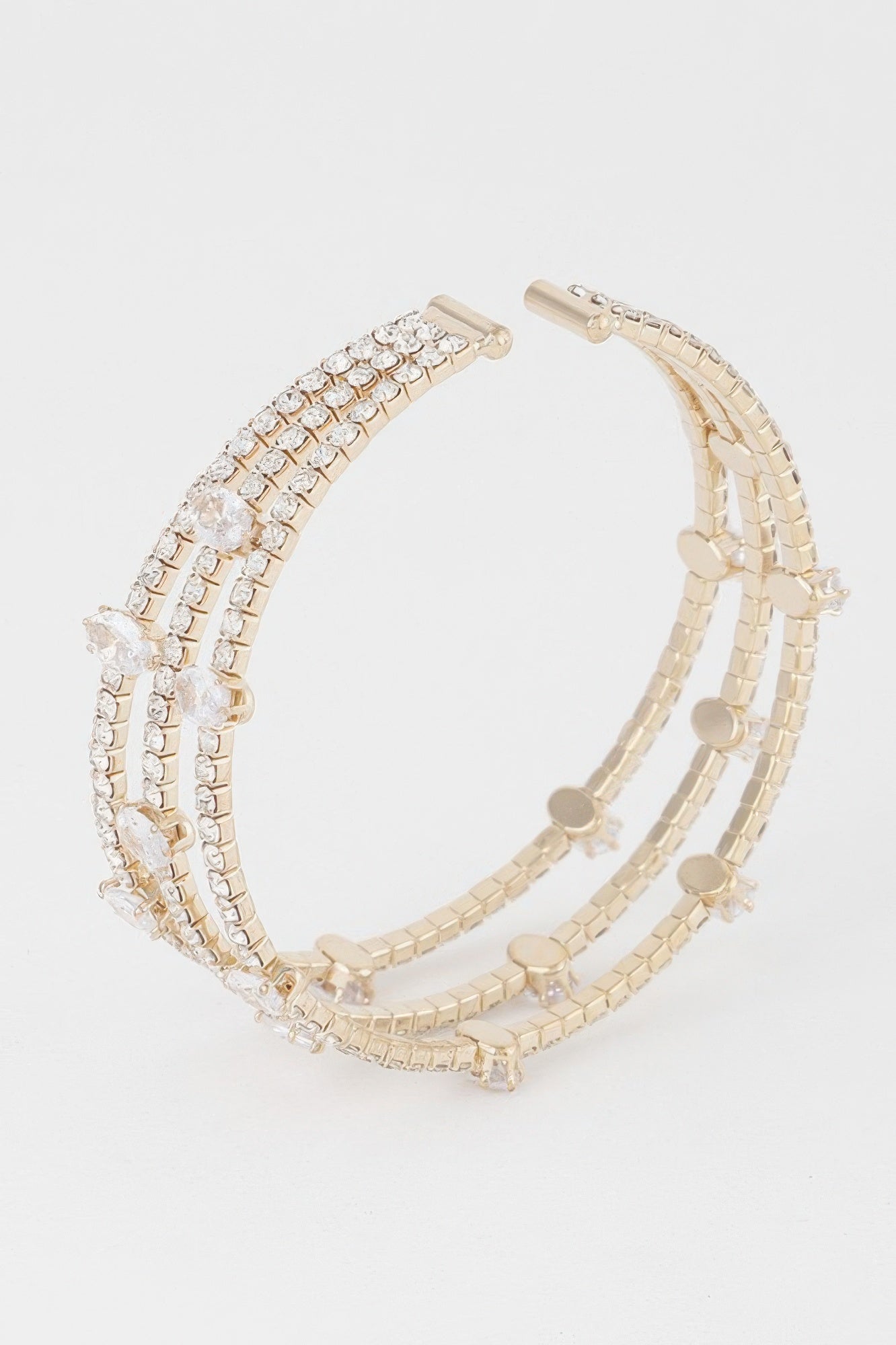 Gold clear cubic rhinestone bracelet with multiple rows and round link accents
