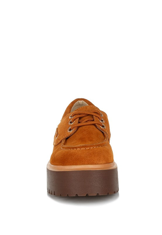 Tan suede lace-up oxford loafer with stacked heel and chunky treaded sole