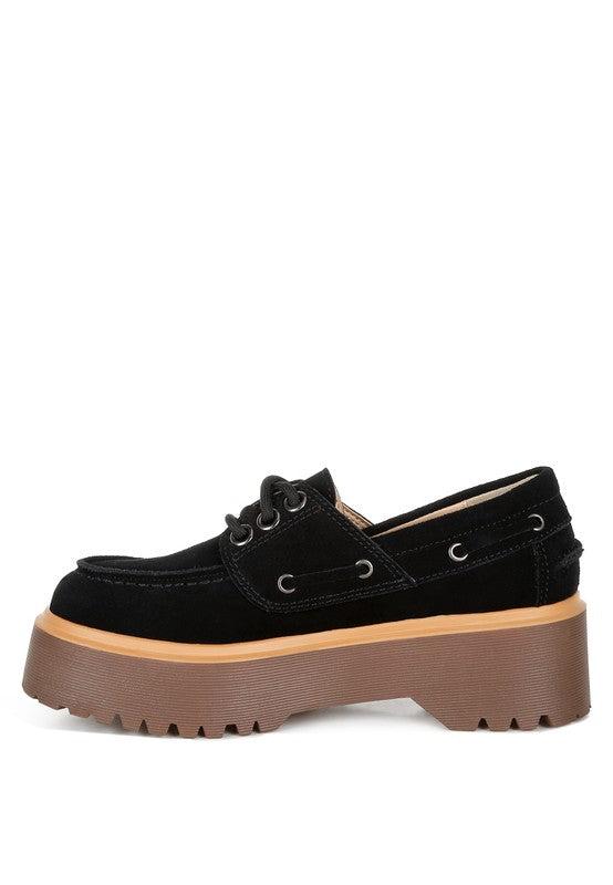Black suede oxford loafer with lace-up closure and chunky treaded platform sole