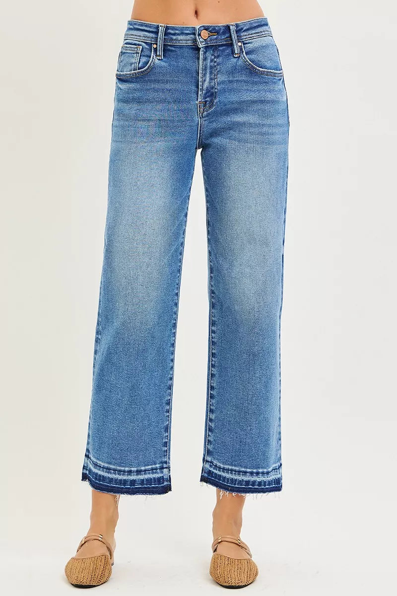 Medium-wash slouchy cropped boyfriend jeans, full-size; button fly and front pockets