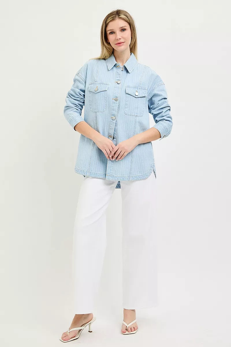 Light-wash oversized denim shaket with point collar and two chest flap pockets