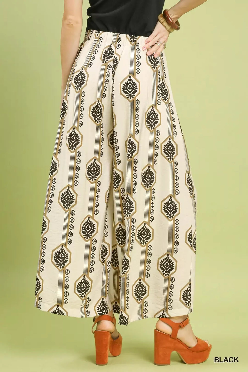 Wide-leg pants, front-to-back view: cream with vertical stripe and floral medallion print