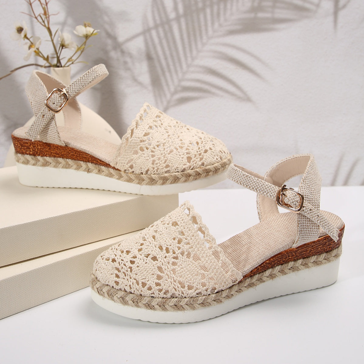 Ivory crochet espadrille sandals, adjustable ankle buckle strap and brown-trim jute wedge sole