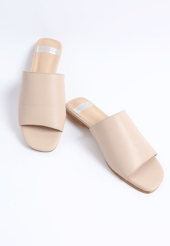 Beige leather slide sandals, open square toe, wide strap, low flat sole