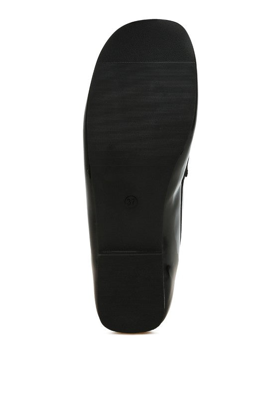 Black patent pleather loafer outsole, textured tread pattern