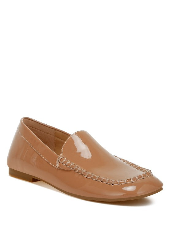 Beige patent pleather loafer, stitched apron detail, low block heel
