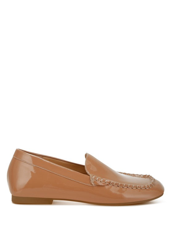 Beige patent pleather loafer, low block heel and glossy patent upper