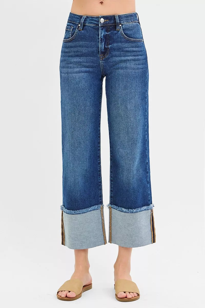 Dark blue mid-rise wide-leg jeans, cropped length with light cuff hems
