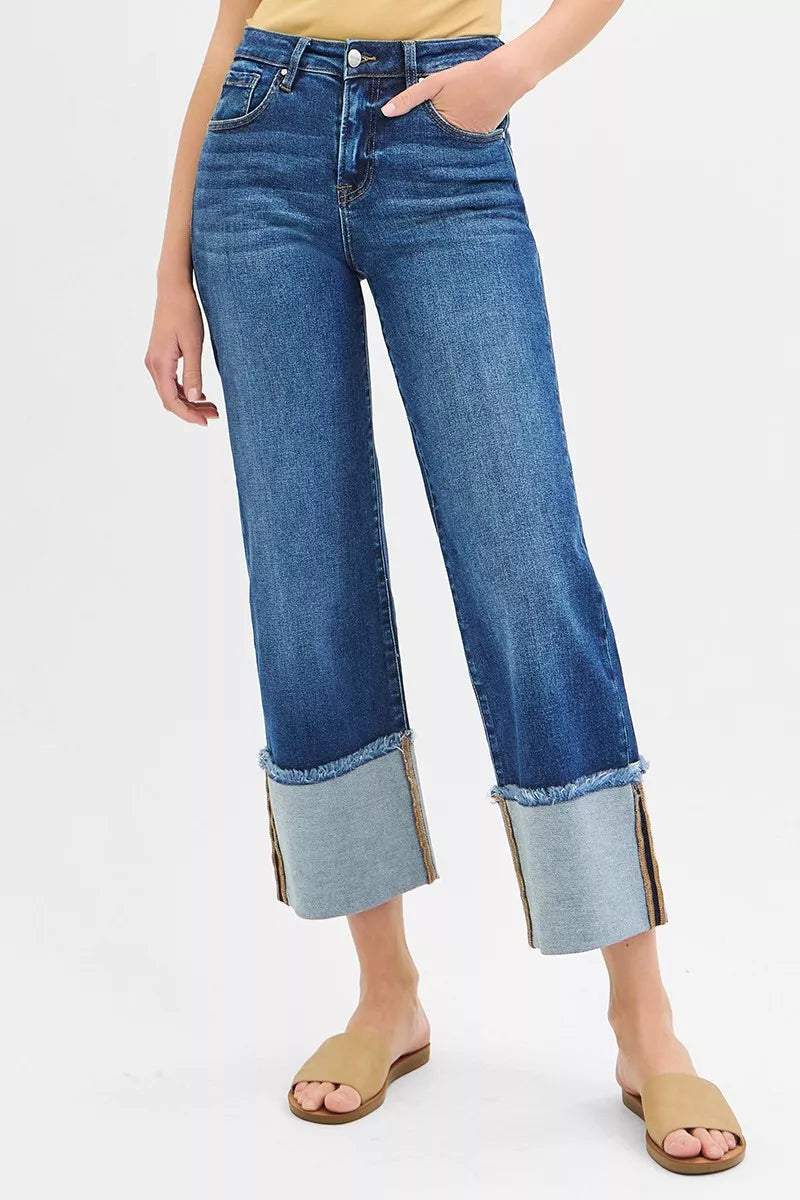 Dark blue mid-rise wide-leg crop jeans with belt loops and cuffed hem detail