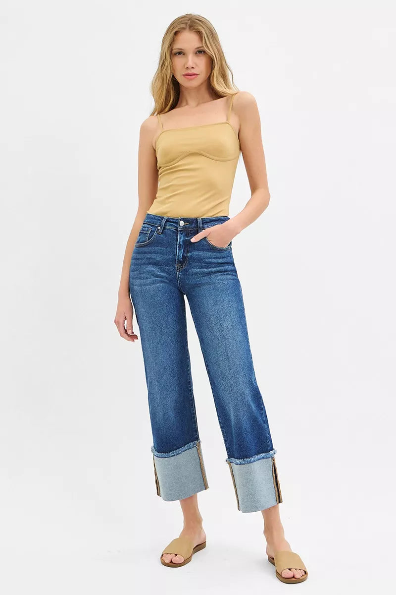 Dark blue mid-rise wide-leg crop jeans with cuffed hems and front pockets