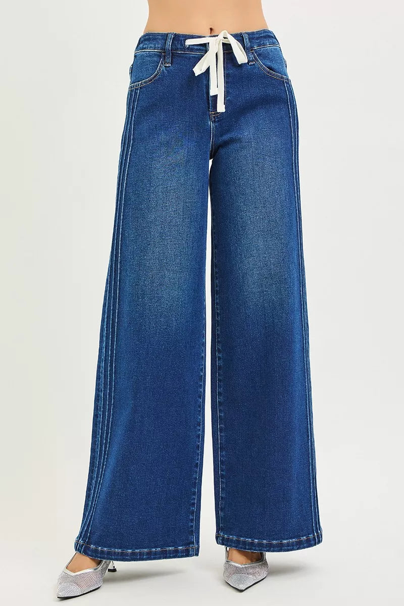Blue mid-rise wide-leg jeans with white drawstring tie, rear view