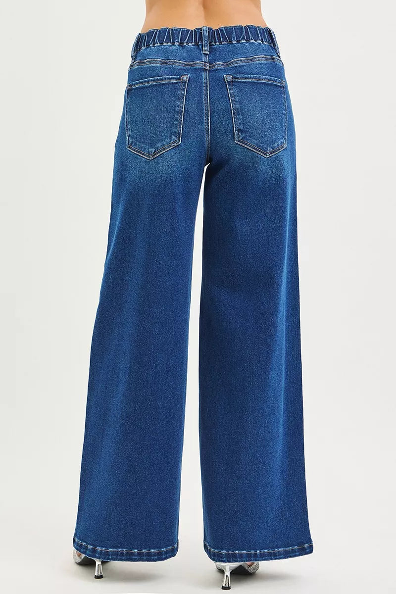Blue wide-leg jeans with elastic waistband and two back patch pockets