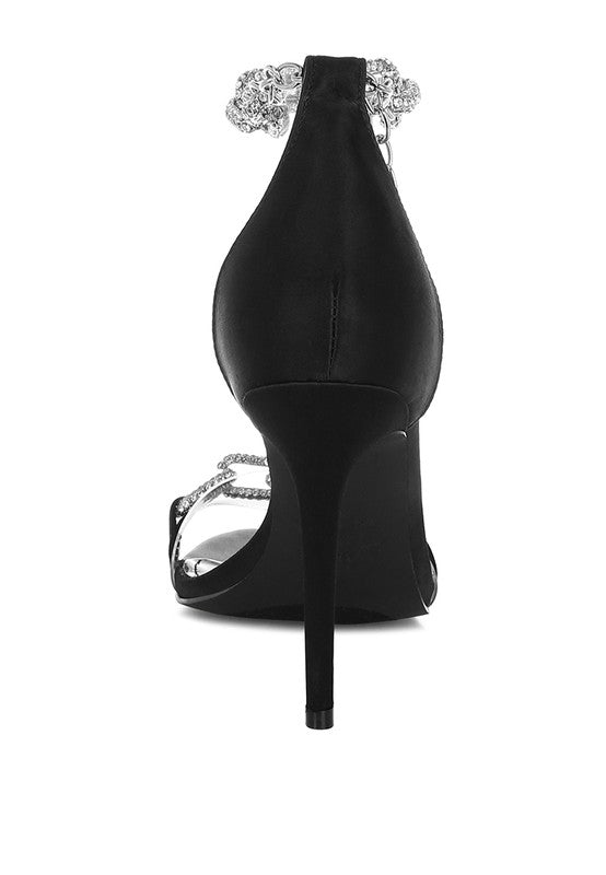 Black stiletto sandal rear view with rhinestone ankle embellishment
