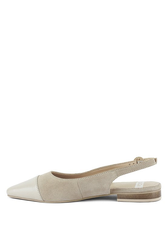 Light beige slingback flats with pointed toe, low block heel, and back strap