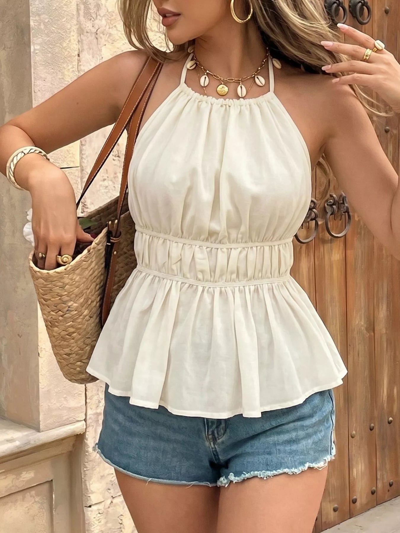 White halter neck cami with gathered high neck and tiered flounce peplum